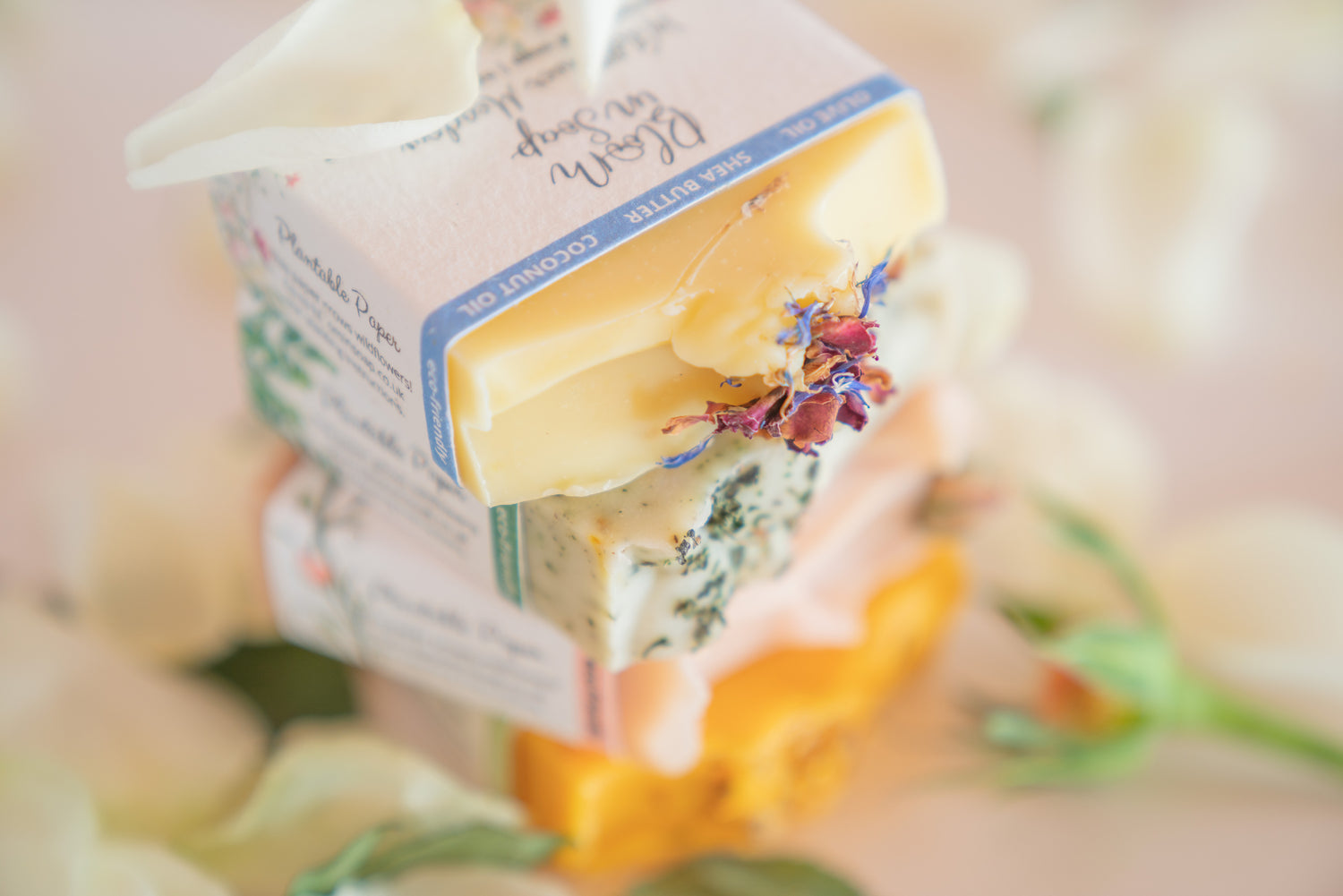 a stack of natural soap bars