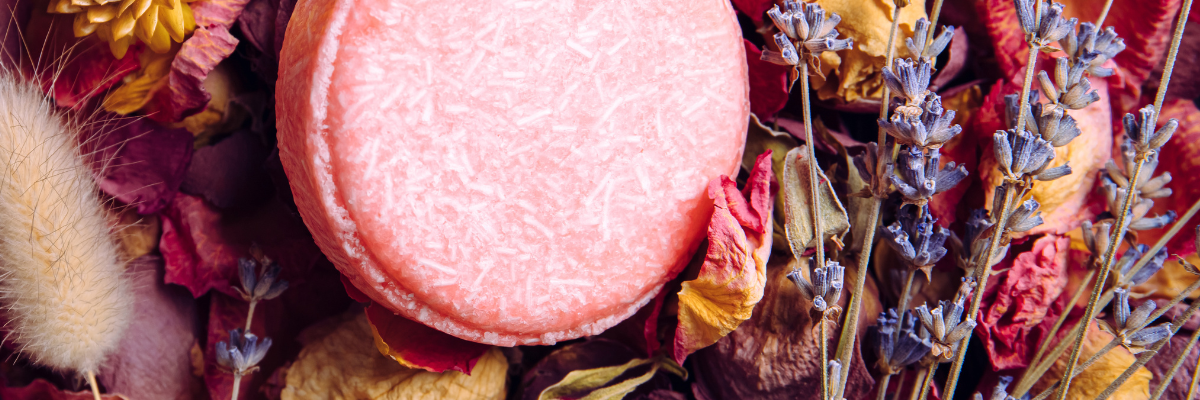 pink shampoo bar in various flowers