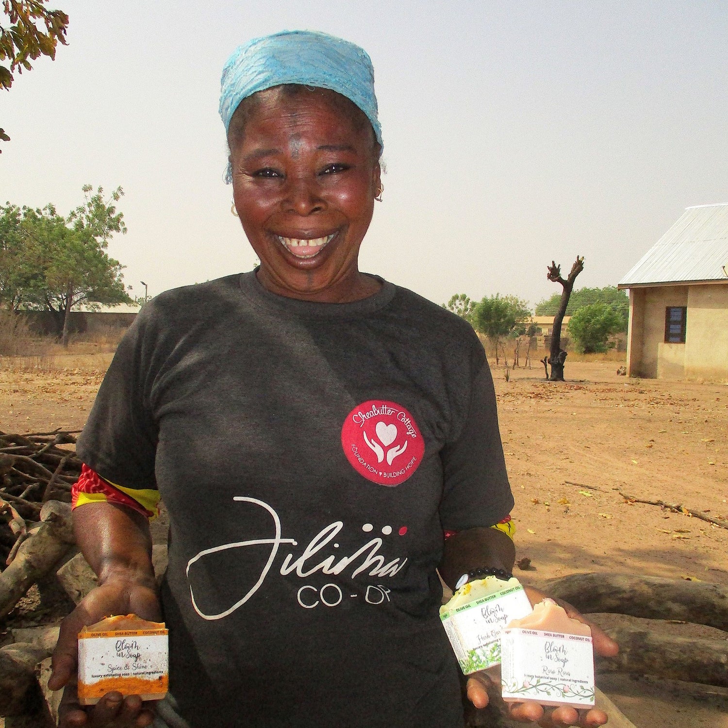 African woman holding soap