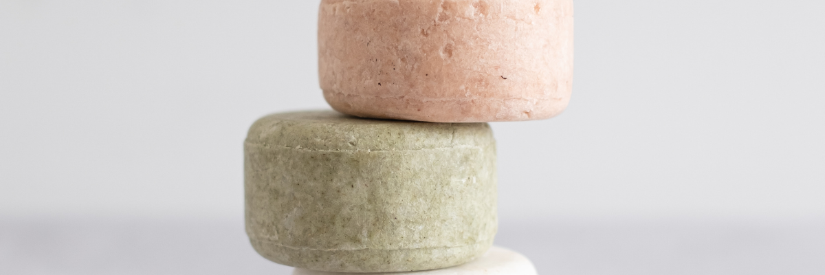 stack of solid shampoo bars
