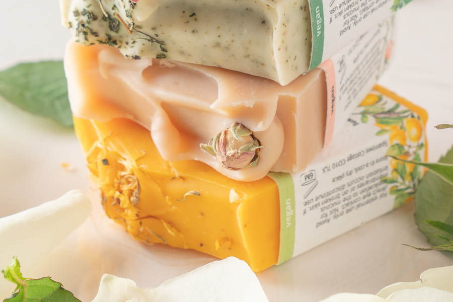 a stack of all natural soap bars