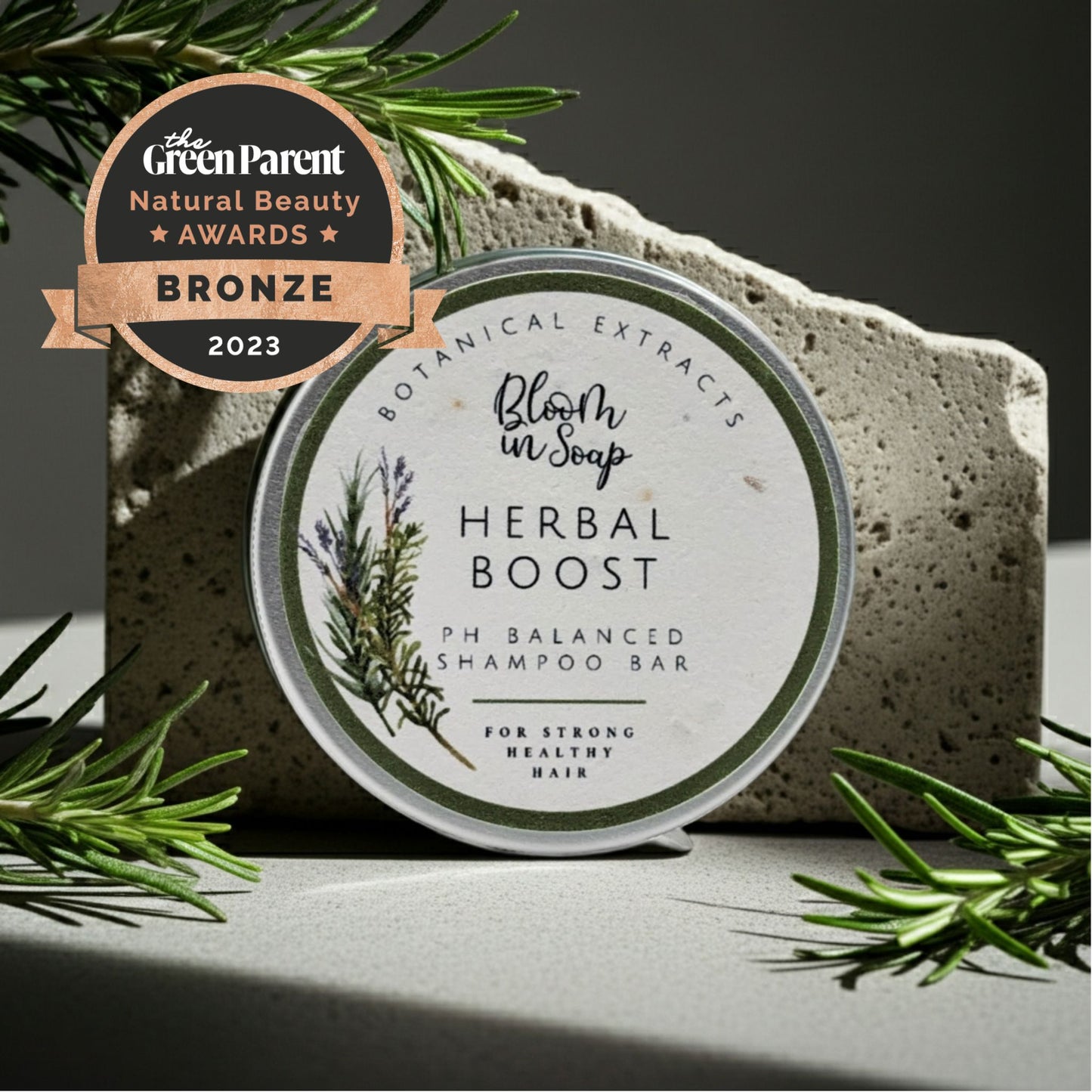 Herbal Boost shampoo bar with 'The Green Parent' award on a dark background