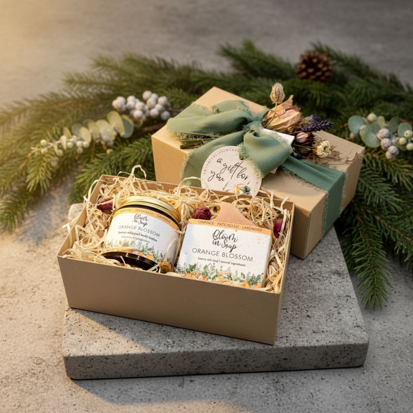 a gift box with body butter and soap