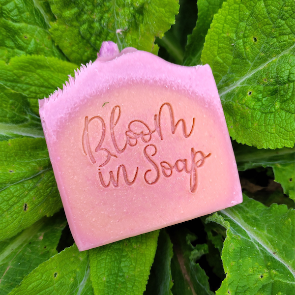 A bar of pink natural soap