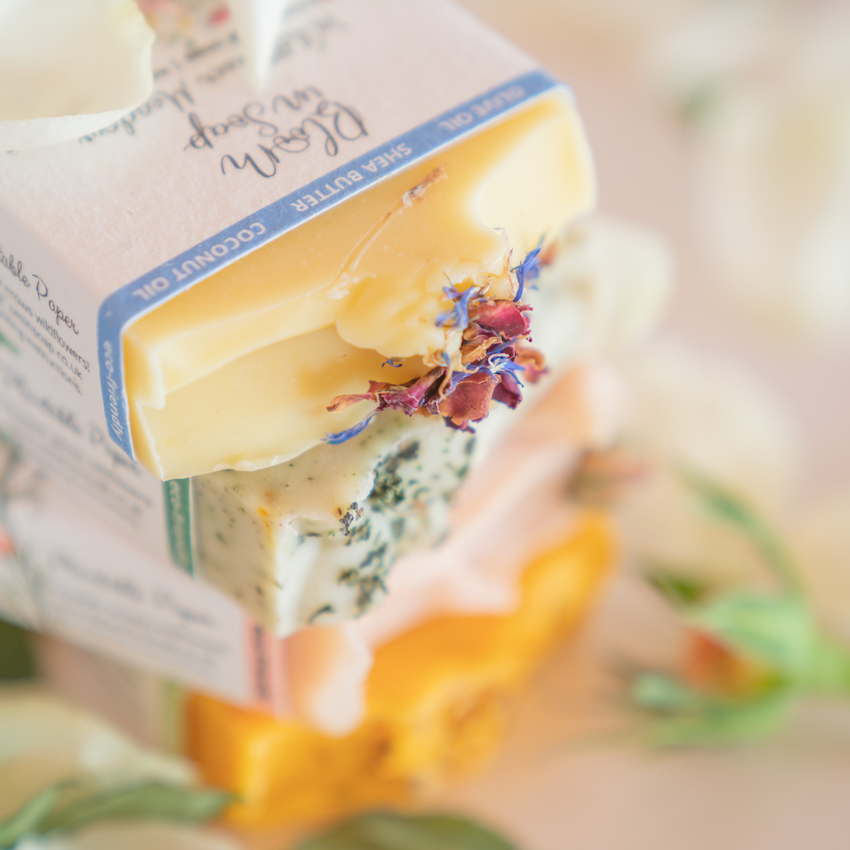 A stack of natural soaps