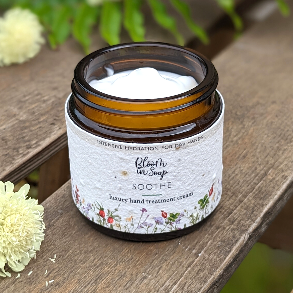 Jar of luxury hand cream with a plantable label from Bloom In Soap