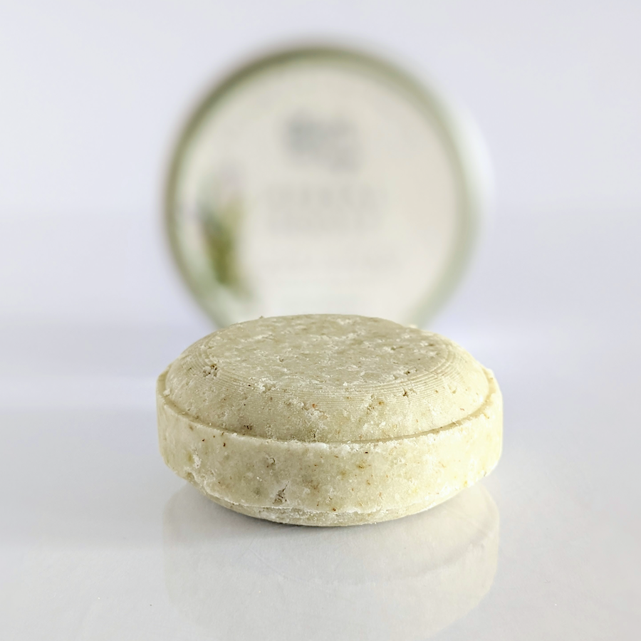 herbal boost green shampoo bar in a tin