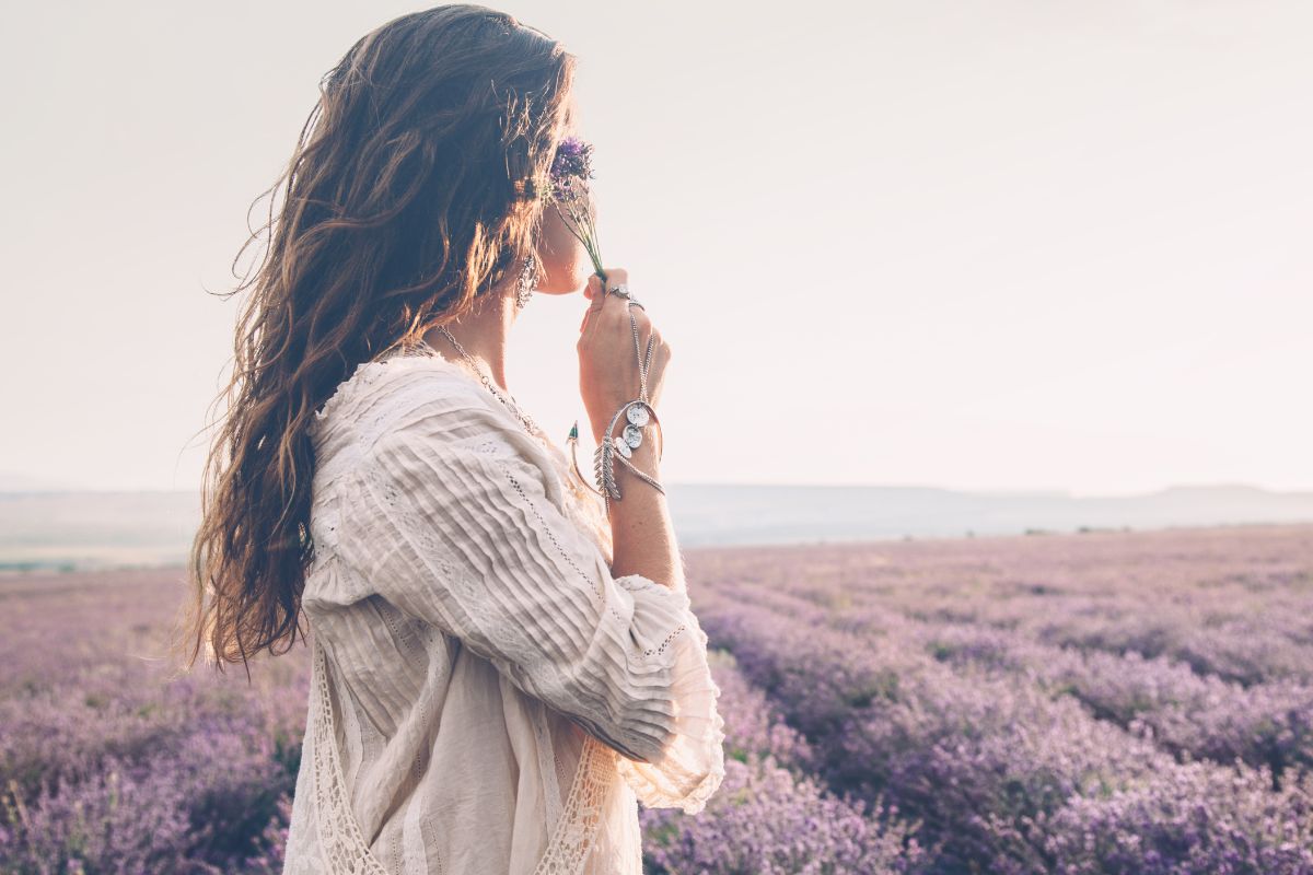 a woman with sensitive skin in a lavender field